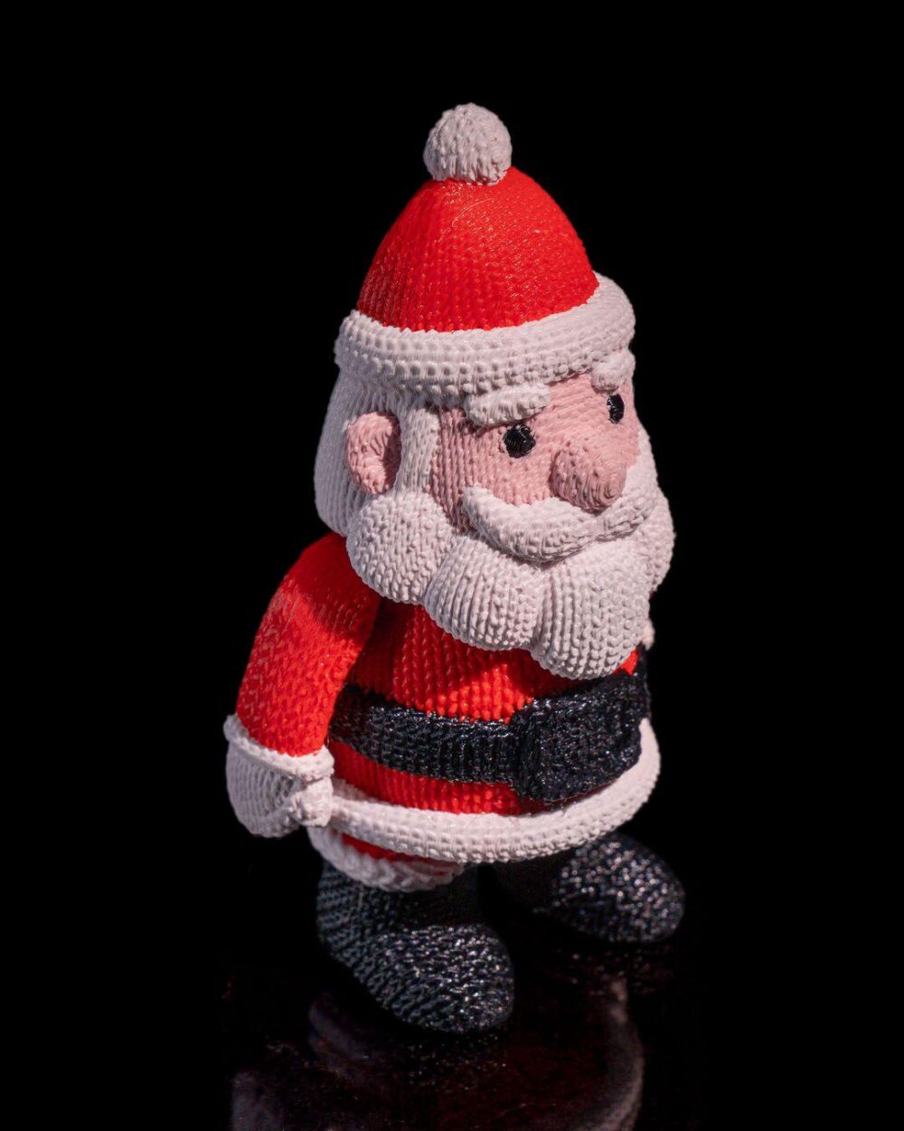 Santa Claus Figure – Festive Christmas Decor, Holiday Gift, Collectible Ornament featuring a knitted design.