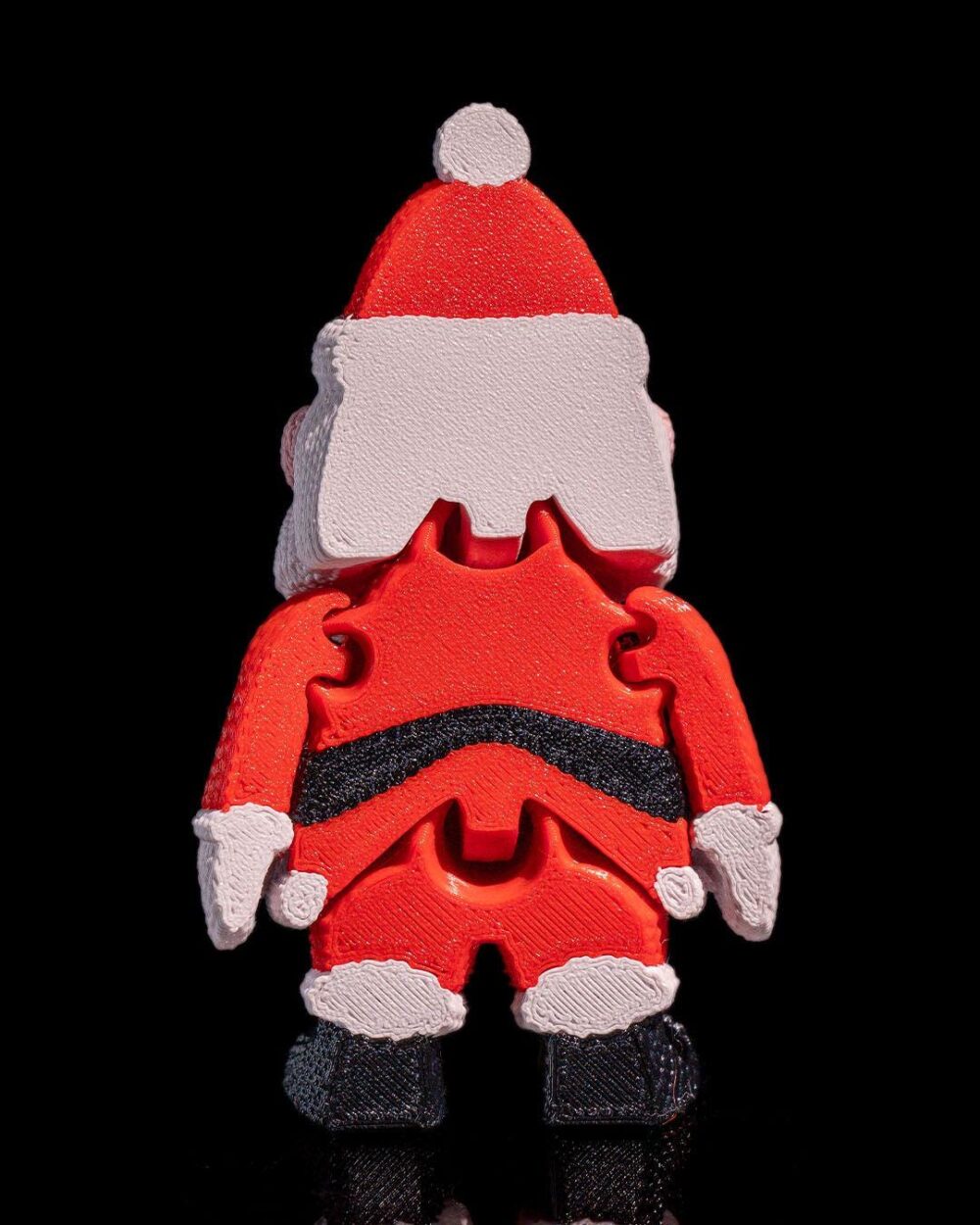 Santa Claus Figure with puzzle-piece design, red suit, white beard and gloves. Perfect for festive Christmas decor or holiday gift.