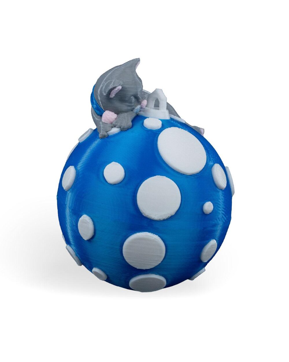 Handcrafted Sleeping Cat Christmas Ornament on a blue polka-dot ball, perfect for unique feline holiday decor and whimsical festive keepsakes.