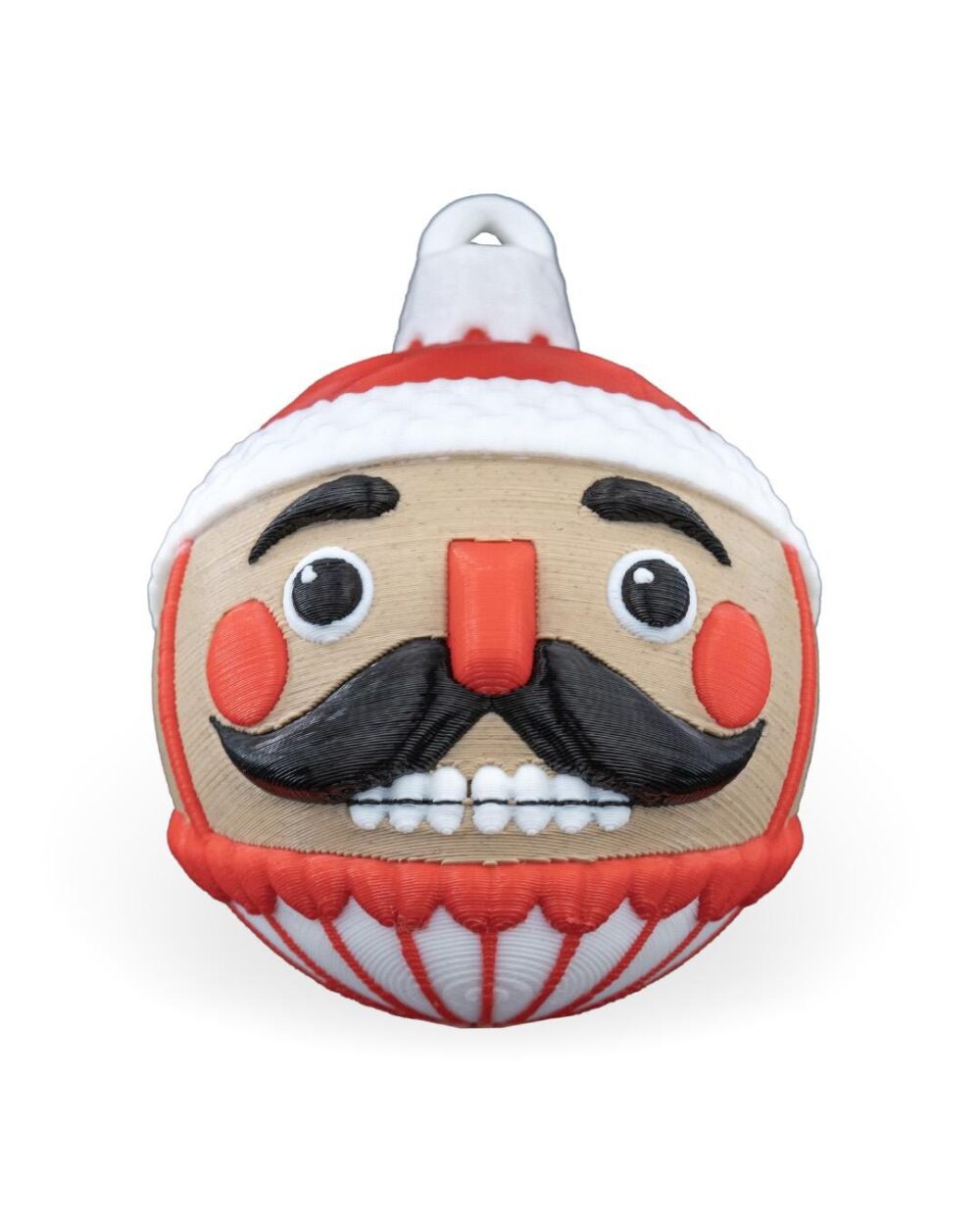 Handcrafted Nutcracker Christmas Ornament with red hat, black mustache, rosy cheeks on product page for festive holiday decoration.