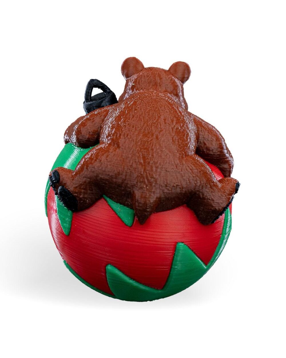 Handmade Charming Sleeping Bear Christmas Ornament, featuring a brown bear resting on a red and green festive holiday ball.