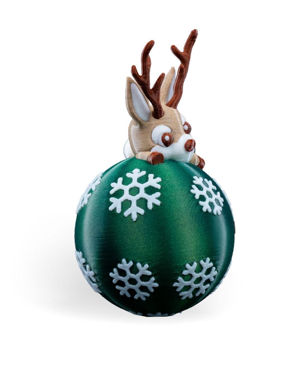 Handmade Lying Reindeer Christmas Ornament featuring a cute reindeer with antlers on a green ball decorated with white snowflakes.